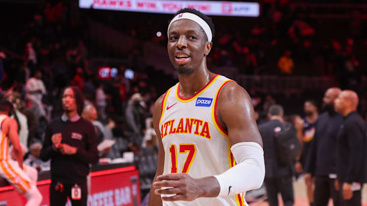 Jan 23, 2026; Atlanta, Georgia, USA; Atlanta Hawks forward Onyeka Okongwu (17) celebrates after a victory over the Phoenix Suns at State Farm Arena. Mandatory Credit: Brett Davis-Imagn Images
