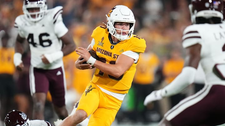 Arizona State quarterback Sam Leavitt (10) scrambles out of the backfield against the Mississippi State Bulldogs at Mountain America Stadium in Tempe on Sept. 7, 2024.