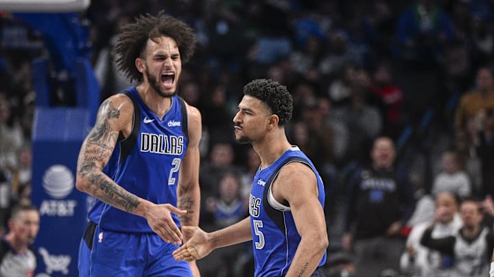 Jan 9, 2025; Dallas, Texas, USA; Dallas Mavericks center Dereck Lively II (2) and guard Quentin Grimes (5) celebrate during the second half against the Portland Trail Blazers at the American Airlines Center. Mandatory Credit: Jerome Miron-Imagn Images