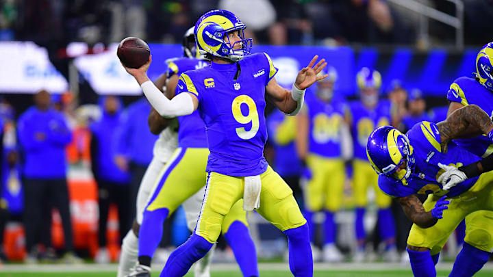 Nov 24, 2024; Inglewood, California, USA; Los Angeles Rams quarterback Matthew Stafford (9) throws against the Philadelphia Eagles during the second half at SoFi Stadium. Mandatory Credit: Gary A. Vasquez-Imagn Images