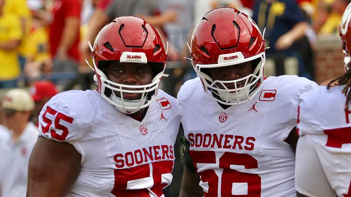 Oklahoma offensive linemen Eddy Pierre-Louis and Michael Fasusi warm up before facing Michigan. Oklahoma offensive linemen Eddy Pierre-Louis and Michael Fasusi warm up before facing Michigan.