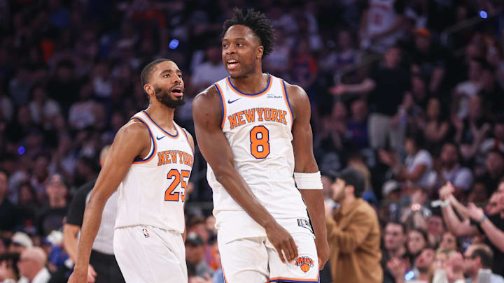 New York Knicks forward OG Anunoby celebrates after scoring with forward Mikal Bridges.