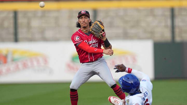 Chattanooga infielder Edwin Arroyo (4) throws the ball after getting Knoxville infielder Jaylen Palmer (6) out during a minor league baseball game between the Knoxville Smokies and Chattanooga Lookouts at Covenant Health Park in Knoxville, Tenn., on June 3, 2025. Chattanooga infielder Edwin Arroyo (4) throws the ball after getting Knoxville infielder Jaylen Palmer (6) out during a minor league baseball game between the Knoxville Smokies and Chattanooga Lookouts at Covenant Health Park in Knoxville, Tenn., on June 3, 2025.