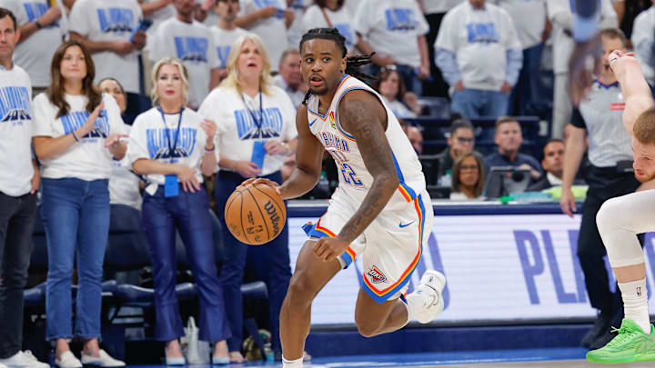 May 20, 2025; Oklahoma City, Oklahoma, USA; Oklahoma City Thunder guard Cason Wallace (22) drives to the basket against the Minnesota Timberwolves in the fourth quarter during game one of the western conference finals for the 2025 NBA Playoffs at Paycom Center. Mandatory Credit: Alonzo Adams-Imagn Images May 20, 2025; Oklahoma City, Oklahoma, USA; Oklahoma City Thunder guard Cason Wallace (22) drives to the basket against the Minnesota Timberwolves in the fourth quarter during game one of the western conference finals for the 2025 NBA Playoffs at Paycom Center. Mandatory Credit: Alonzo Adams-Imagn Images