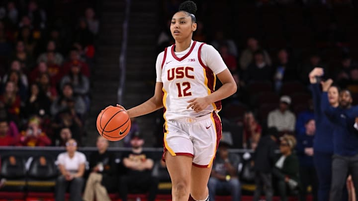 Jan 12, 2025; Los Angeles, California, USA; USC Trojans guard JuJu Watkins (12) dribbles the ball downcourt during the first quarter against the Penn State Nittany Lions at Galen Center. Mandatory Credit: Robert Hanashiro-Imagn Images