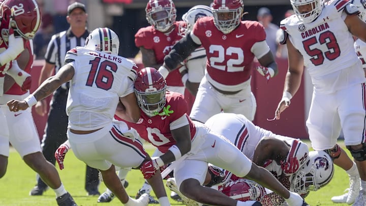 Oct 12, 2024; Tuscaloosa, Alabama, USA;  South Carolina Gamecocks quarterback LaNorris Sellers (16) is sacked for a loss by Alabama Crimson Tide linebacker Deontae Lawson (0) at Bryant-Denny Stadium. Mandatory Credit: Gary Cosby Jr.-Imagn Images