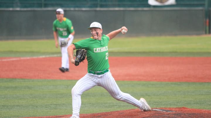 Newark Catholic's Owen Przymierski pitches during the Green Wave's 9-3 victory against South Webster to win the Division VII regional championship at Ohio University's Bob Wren Stadium on June 5, 2025. Newark Catholic's Owen Przymierski pitches during the Green Wave's 9-3 victory against South Webster to win the Division VII regional championship at Ohio University's Bob Wren Stadium on June 5, 2025.