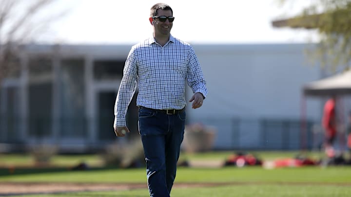 Cincinnati Reds general manager Nick Krall takes a phone call.