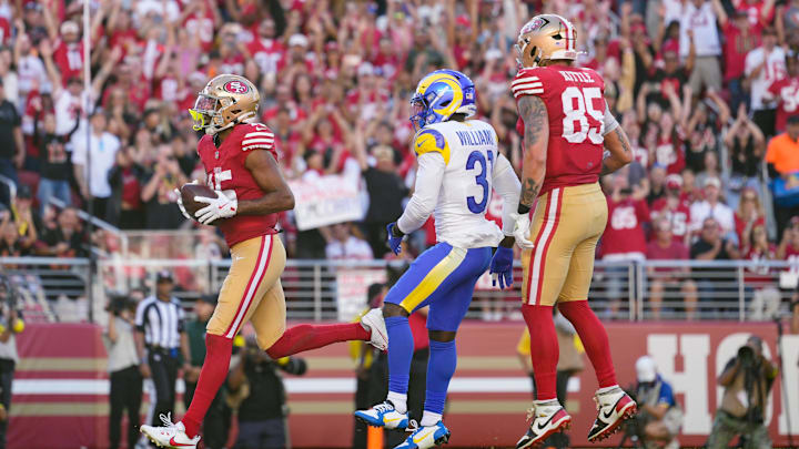 Nov 9, 2025; Santa Clara, California, USA; San Francisco 49ers wide receiver Jauan Jennings (15) scores a touchdown past Los Angeles Rams cornerback Darious Williams (31) during the second quarter at Levi's Stadium. Mandatory Credit: Kyle Terada-Imagn Images Nov 9, 2025; Santa Clara, California, USA; San Francisco 49ers wide receiver Jauan Jennings (15) scores a touchdown past Los Angeles Rams cornerback Darious Williams (31) during the second quarter at Levi's Stadium. Mandatory Credit: Kyle Terada-Imagn Images