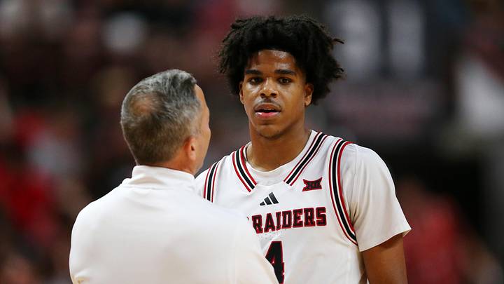 Mar 3, 2026; Lubbock, Texas, USA;  Texas Tech Red Raiders head coach Grant McCasland visits with Texas Tech Red Raiders guard Christian Anderson (4) in the second half of the game against the TCU Horned Frogs at United Supermarkets Arena. Mandatory Credit: Michael C. Johnson-Imagn Images