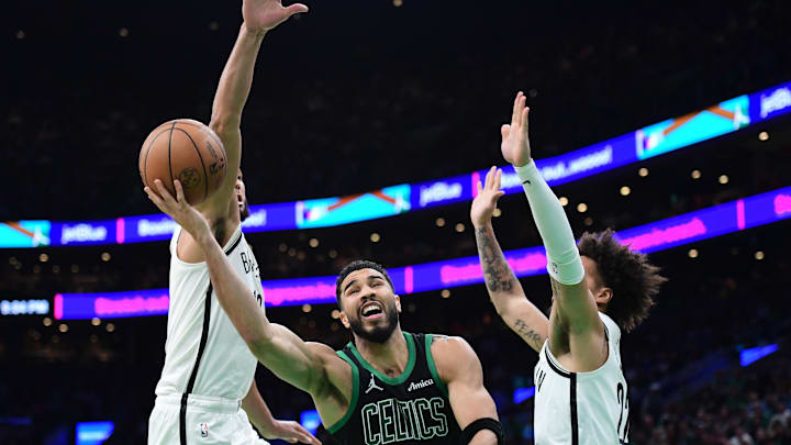 Nov 8, 2024; Boston, Massachusetts, USA; Boston Celtics forward Jayson Tatum (0) drives to the basket between Brooklyn Nets guard Ben Simmons (10) and forward Jalen Wilson (22) during the second half at TD Garden. Mandatory Credit: Bob DeChiara-Imagn Images Nov 8, 2024; Boston, Massachusetts, USA; Boston Celtics forward Jayson Tatum (0) drives to the basket between Brooklyn Nets guard Ben Simmons (10) and forward Jalen Wilson (22) during the second half at TD Garden. Mandatory Credit: Bob DeChiara-Imagn Images