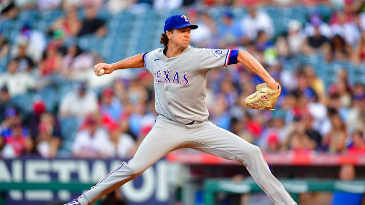 Jul 7, 2025; Anaheim, California, USA; Texas Rangers pitcher Jacob deGrom (48) throws against the Los Angeles Angels during the first inning at Angel Stadium. Mandatory Credit: Gary A. Vasquez-Imagn Images