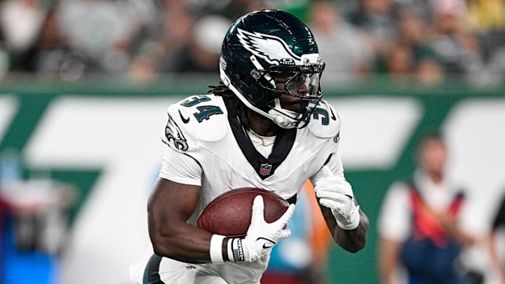 Aug 22, 2025; East Rutherford, New Jersey, USA; Philadelphia Eagles running back Montrell Johnson Jr. (34) runs with the ball during the first quarter against the New York Jets at MetLife Stadium. Mandatory Credit: Mark Smith-Imagn Images