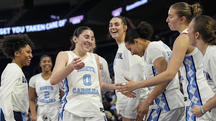 Mar 6, 2026; Duluth, GA, USA; North Carolina Tar Heels guard Lanie Grant (0) reacts with teammates on the bench during the game against the Virginia Tech Hokies at Gas South Arena. Mandatory Credit: Dale Zanine-Imagn Images Mar 6, 2026; Duluth, GA, USA; North Carolina Tar Heels guard Lanie Grant (0) reacts with teammates on the bench during the game against the Virginia Tech Hokies at Gas South Arena. Mandatory Credit: Dale Zanine-Imagn Images