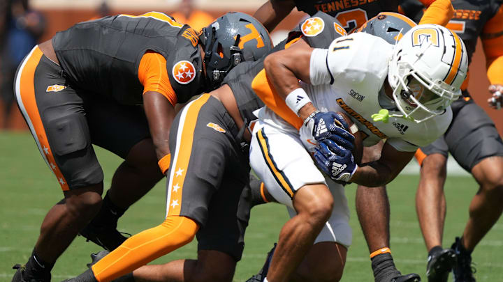 Chattanooga wide receiver Sam Phillips (11) is tackled during a game between Tennessee and Chattanooga, Saturday, Aug. 31, 2024.