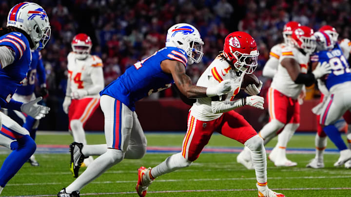 Kansas City Chiefs wide receiver Xavier Worthy runs with the ball against Buffalo Bills cornerback Rasul Douglas. Kansas City Chiefs wide receiver Xavier Worthy runs with the ball against Buffalo Bills cornerback Rasul Douglas.