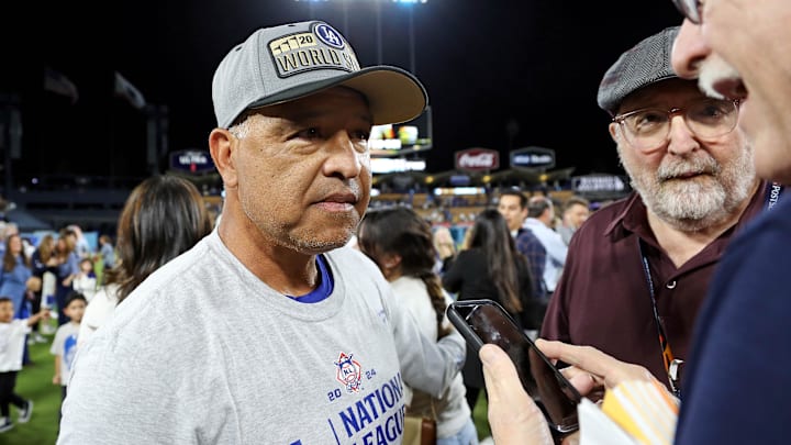 Oct 20, 2024; Los Angeles, California, USA; Los Angeles Dodgers manager Dave Roberts (30) is interviewed after the Los Angeles Dodgers beat the New York Mets in game six of the NLCS for the 2024 MLB playoffs at Dodger Stadium. Mandatory Credit: Kiyoshi Mio-Imagn Images