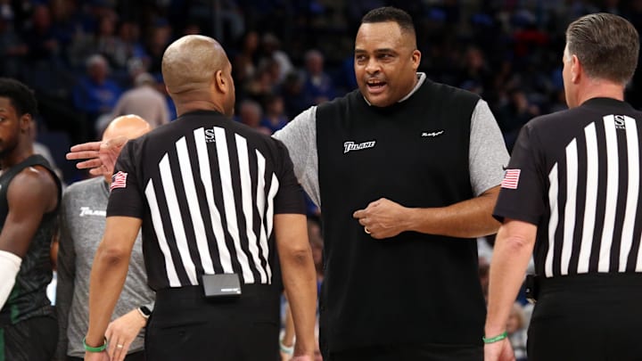 Feb 11, 2024; Memphis, Tennessee, USA; Tulane Green Wave head coach Ron Hunter reacts toward the officials during the first half against the Memphis Tigers at FedExForum.