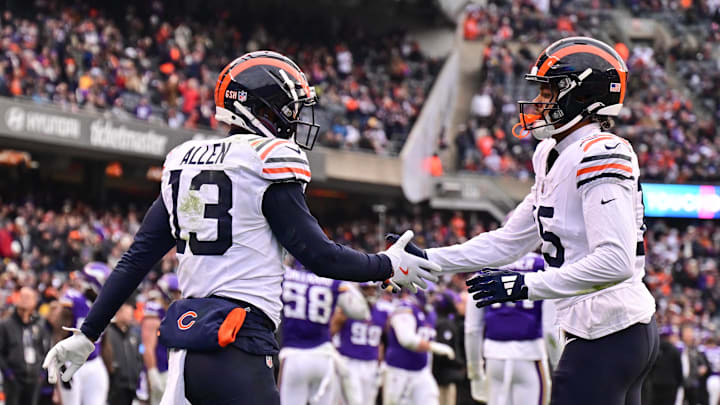 Nov 24, 2024; Chicago, Illinois, USA; Chicago Bears wide receiver Keenan Allen (13) celebrates his touchdown reception with wide receiver Rome Odunze (15) against the Minnesota Vikings during the fourth quarter at Soldier Field. Mandatory Credit: Daniel Bartel-Imagn Images