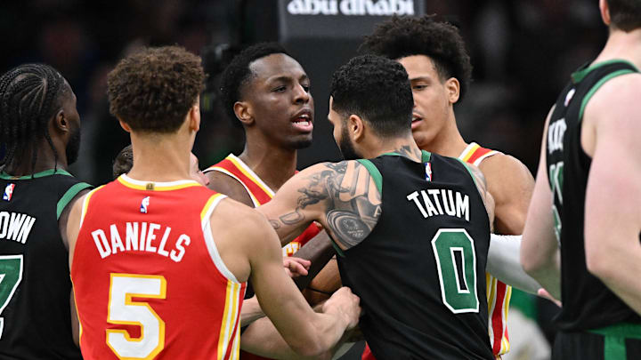 Jan 18, 2025; Boston, Massachusetts, USA; Atlanta Hawks forward Onyeka Okongwu (17) and Boston Celtics forward Jayson Tatum (0) battle for the ball during overtime at the TD Garden. Mandatory Credit: Brian Fluharty-Imagn Images Jan 18, 2025; Boston, Massachusetts, USA; Atlanta Hawks forward Onyeka Okongwu (17) and Boston Celtics forward Jayson Tatum (0) battle for the ball during overtime at the TD Garden. Mandatory Credit: Brian Fluharty-Imagn Images