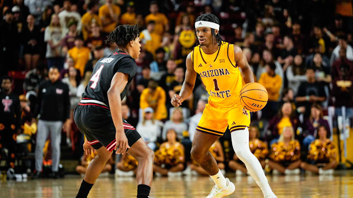 Mar 8, 2025; Tempe, Arizona, USA; Arizona State Sun Devil guard Alston Mason (1) dribbles the ball against Texas Tech Red Raiders guard Christian Anderson (4) at Desert Financial Arena. Mandatory Credit: Arianna Grainey-Imagn Images Mar 8, 2025; Tempe, Arizona, USA; Arizona State Sun Devil guard Alston Mason (1) dribbles the ball against Texas Tech Red Raiders guard Christian Anderson (4) at Desert Financial Arena. Mandatory Credit: Arianna Grainey-Imagn Images