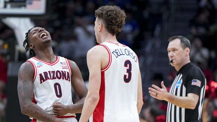 Mar 23, 2025; Seattle, WA, USA;  Arizona Wildcats guard Jaden Bradley (0) reacts with guard Anthony Dell'Orso (3) in the game against the Oregon Ducks in the second half at Climate Pledge Arena. Mandatory Credit: Stephen Brashear-Imagn Images