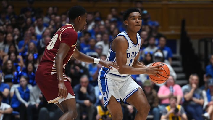 Feb 10, 2024; Durham, North Carolina, USA;Duke Blue Devils guard Caleb Foster (1) looks to pass as Boston College Eagles guard Chas Kelley III (00) defends during the second half at Cameron Indoor Stadium. Mandatory Credit: Rob Kinnan-Imagn Images Feb 10, 2024; Durham, North Carolina, USA;Duke Blue Devils guard Caleb Foster (1) looks to pass as Boston College Eagles guard Chas Kelley III (00) defends during the second half at Cameron Indoor Stadium. Mandatory Credit: Rob Kinnan-Imagn Images