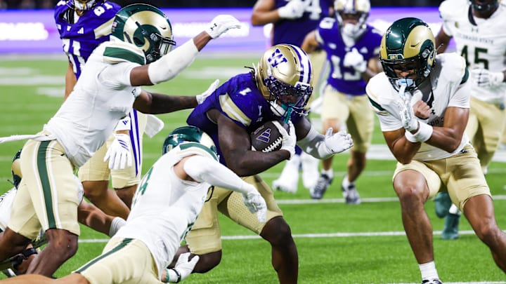 Aug 30, 2025; Seattle, Washington, USA; Washington Huskies running back Jonah Coleman (1) rushes against the Colorado State Rams during the fourth quarter at Husky Stadium. Mandatory Credit: Joe Nicholson-Imagn Images Aug 30, 2025; Seattle, Washington, USA; Washington Huskies running back Jonah Coleman (1) rushes against the Colorado State Rams during the fourth quarter at Husky Stadium. Mandatory Credit: Joe Nicholson-Imagn Images