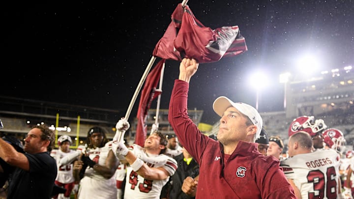 Nov 9, 2024; Nashville, Tennessee, USA;  South Carolina Gamecocks head coach Shane Beamer and his team celebrate the win with their fans against the Vanderbilt Commodores during the second half at FirstBank Stadium. Mandatory Credit: Steve Roberts-Imagn Images