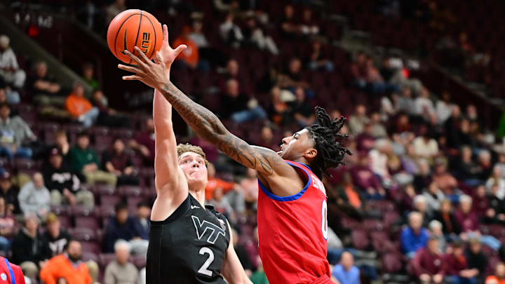 Feb 5, 2025; Blacksburg, Va.; SMU guard B.J. Edwards (0) shoots the ball as Virginia Tech guard Jaden Schutt (2) defends. Feb 5, 2025; Blacksburg, Va.; SMU guard B.J. Edwards (0) shoots the ball as Virginia Tech guard Jaden Schutt (2) defends.