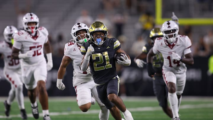 Sep 20, 2025; Atlanta, Georgia, USA; Georgia Tech Yellow Jackets running back Daylon Gordon (21) runs the ball for a touchdown against the Temple Owls in the fourth quarter at Bobby Dodd Stadium at Hyundai Field. Mandatory Credit: Brett Davis-Imagn Images
