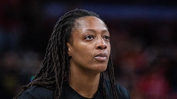 Sep 26, 2025; Indianapolis, Indiana, USA; Indiana Fever guard Kelsey Mitchell (0) looks on during game three against the Las Vegas Aces of the second round for the 2025 WNBA Playoffs at Gainbridge Fieldhouse. Mandatory Credit: Trevor Ruszkowski-Imagn Images