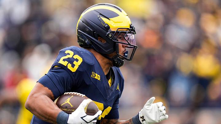 Team Blue running back Jordan Marshall (23) runs the ball against Team Maize during the spring game at Michigan Stadium in Ann Arbor on Saturday, April 18, 2026. Team Blue running back Jordan Marshall (23) runs the ball against Team Maize during the spring game at Michigan Stadium in Ann Arbor on Saturday, April 18, 2026.