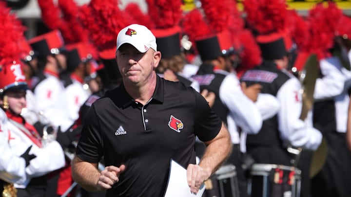 Louisville’s coach Jeff Brohm ran out onto the field before the game against SMU Louisville’s coach Jeff Brohm ran out onto the field before the game against SMU