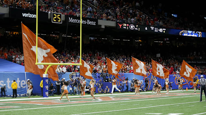 Jan 1, 2019; New Orleans, LA, USA; Texas Longhorns mascot cheerleaders celebrate a score against the Georgia Bulldogs in the second half of the 2019 Sugar Bowl at the Mercedes-Benz Superdome. Mandatory Credit: Chuck Cook-Imagn Images