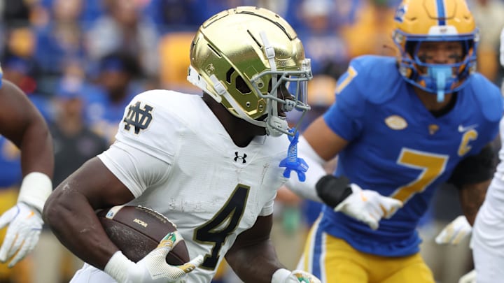 Nov 15, 2025; Pittsburgh, Pennsylvania, USA;  Notre Dame Fighting Irish running back Jeremiyah Love (4) runs the ball against the Pittsburgh Panthers during the second quarter at Acrisure Stadium. 