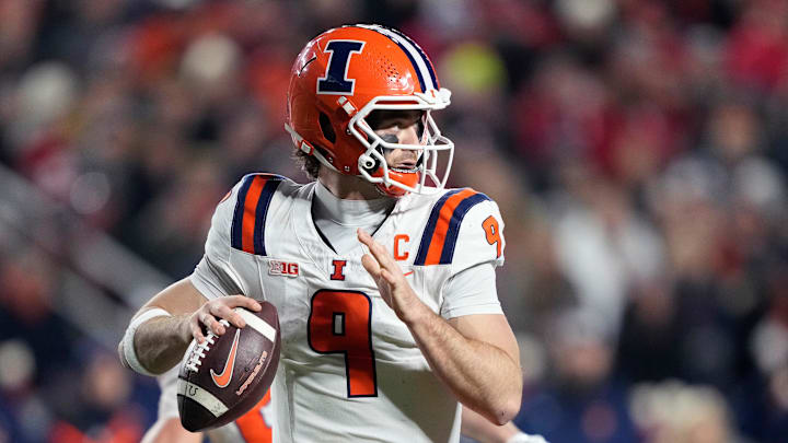 Nov 22, 2025; Madison, Wisconsin, USA; Illinois Fighting Illini quarterback Luke Altmyer (9) throws the ball against the Wisconsin Badgers during the second quarter at Camp Randall Stadium. Mandatory Credit: Kayla Wolf-Imagn Images