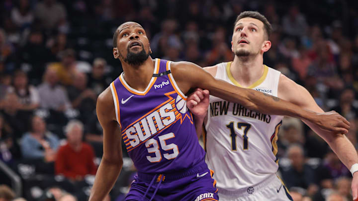 Phoenix Suns forward Durant boxes out New Orleans Pelicans center Matkovic in the first quarter at Footprint Center. 