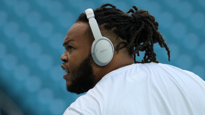 Nov 28, 2021; Miami Gardens, Florida, USA; Miami Dolphins guard Robert Hunt warms up prior to the game against the Carolina Panthers at Hard Rock Stadium. Nov 28, 2021; Miami Gardens, Florida, USA; Miami Dolphins guard Robert Hunt warms up prior to the game against the Carolina Panthers at Hard Rock Stadium.