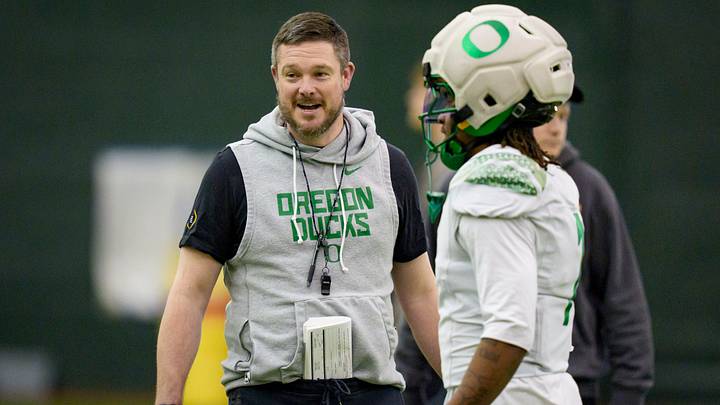 Oregon head coach Dan Lanning walks the field during an open practice ahead of the Orange Bowl at the Moshofsky Center in Eugene, Oregon on Dec. 27, 2025.