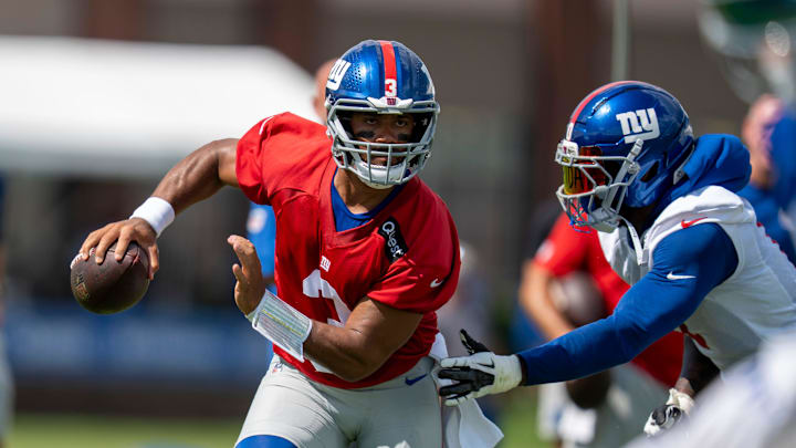 New York Giants quarterback Russell Wilson (3) scrambles with the ball during day one of the New York Giants training camp at Quest Diagnostics Giants Training Center in East Rutherford on Wednesday, July 23, 2025.