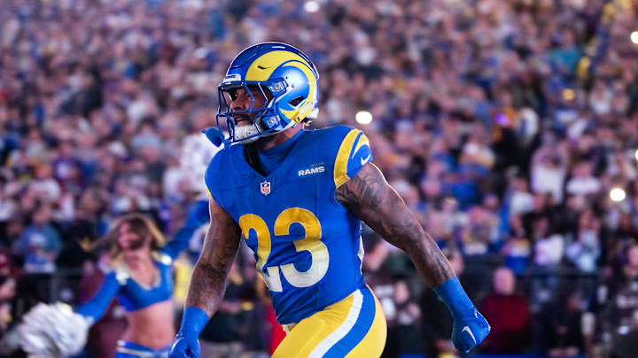 Jan 13, 2025; Glendale, AZ, USA; Los Angeles Rams running back Kyren Williams (23) against the Minnesota Vikings during an NFC wild card game at State Farm Stadium. Mandatory Credit: Mark J. Rebilas-Imagn Images