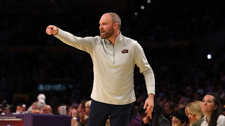 Grizzlies coach Jenkins reacts to a call.