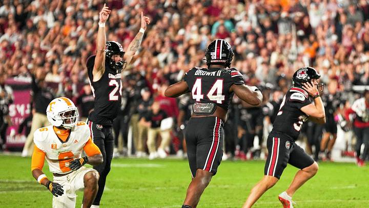 South Carolina place kicker/punter Malik Orsan (32) and Tennessee running back Hunter Barnes (24) celebrate the game-winning field goal during a college football game between Tennessee and South Carolina at Williams-Brice Stadium in Columbia, S.C., on Oct. 24, 2026. South Carolina place kicker/punter Malik Orsan (32) and Tennessee running back Hunter Barnes (24) celebrate the game-winning field goal during a college football game between Tennessee and South Carolina at Williams-Brice Stadium in Columbia, S.C., on Oct. 24, 2026.