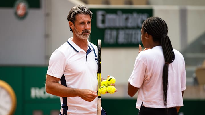 Patrick Mouratoglou speaks with Coco Gauff during a practice session. Patrick Mouratoglou speaks with Coco Gauff during a practice session.