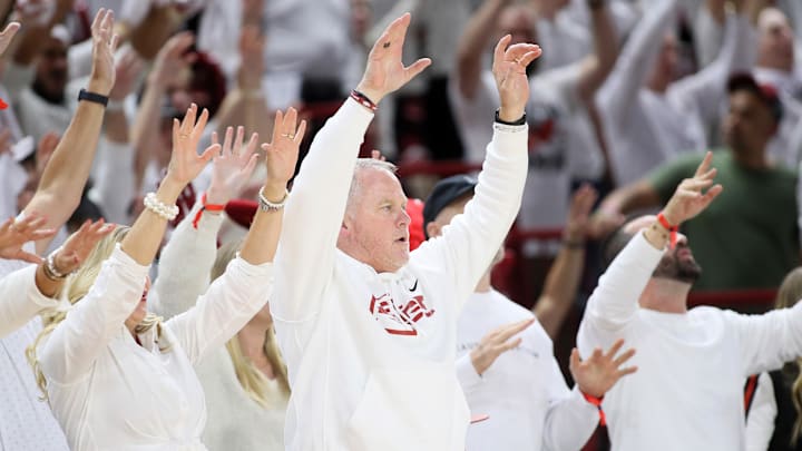 Arkansas Razorbacks athletic director Hunter Yurachek calls the hogs during the seance half against the Duke Blue Devils at Bud Walton Arena. Arkansas won 80-75.