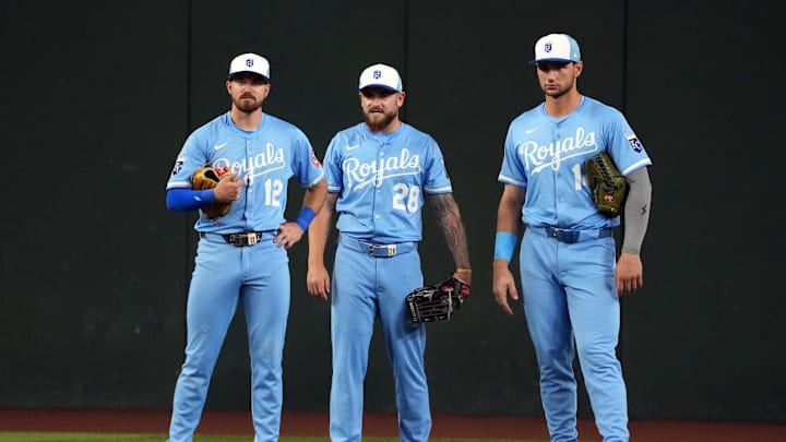 Jul 5, 2025; Phoenix, Arizona, USA; Kansas City Royals left fielder Nick Loftin (12), center fielder Kyle Isbel (28), and Jac Caglianone in the fifth inning against the Arizona Diamondbacks at Chase Field. 