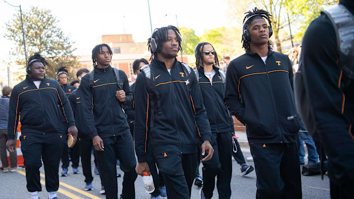 Tennessee football players during the Vol Walk held before Tennessee's Orange & White spring