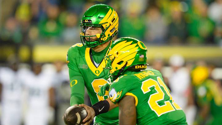 Oregon quarterback Dylan Raiola hands off the ball to Oregon running back Da'jaun Riggs as the Oregon Ducks host the Portland State Vikings on Sept. 18, 2026, at Autzen Stadium in Eugene, Oregon. Oregon quarterback Dylan Raiola hands off the ball to Oregon running back Da'jaun Riggs as the Oregon Ducks host the Portland State Vikings on Sept. 18, 2026, at Autzen Stadium in Eugene, Oregon.