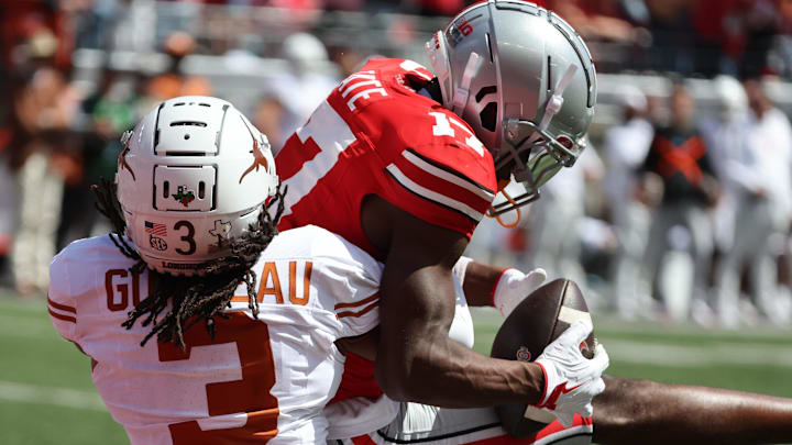 Aug 30, 2025; Columbus, Ohio, USA; Ohio State Buckeyes wide receiver Carnell Tate (17) makes a catch against Texas Longhorns defensive back Jaylon Guilbeau (3) in the first half at Ohio Stadium. Mandatory Credit: Joseph Maiorana-Imagn Images